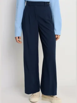 Pantalon large avec pinces à poches fendues et décoratives