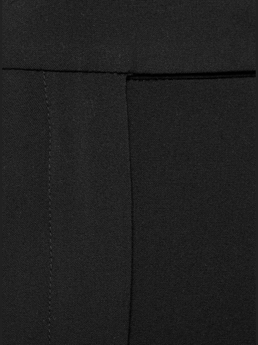 Pantalon large avec pinces à poches fendues et décoratives