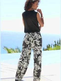 Pantalon large avec poches latérales et imprimé floral