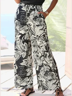 Pantalon large avec poches latérales et imprimé floral