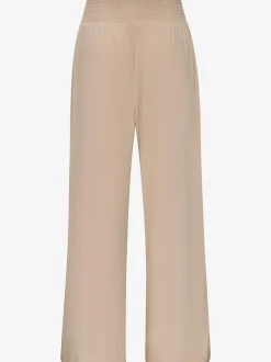 Pantalon large avec poches latérales et détails smockés