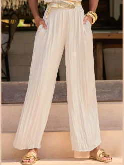 Pantalon à large ceinture élastique avec jambes plissées et poches latérales