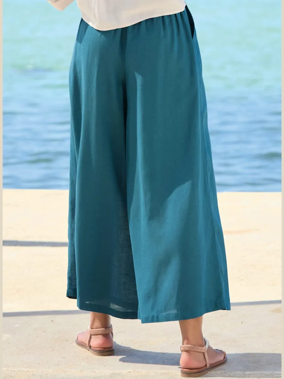 Pantalon large à ceinture plate et élastique au dos