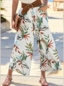 Pantalon large à ceinture plate avec poches fendues et imprimé floral