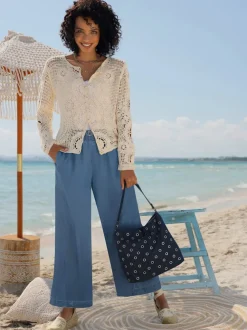 Pantalon large en lyocell à taille haute avec poches