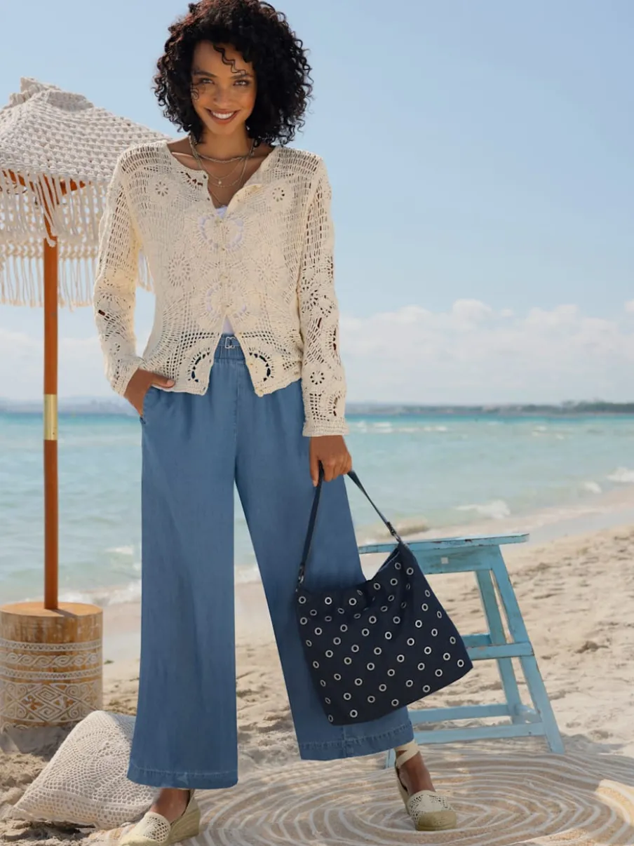 Pantalon large en lyocell à taille haute avec poches