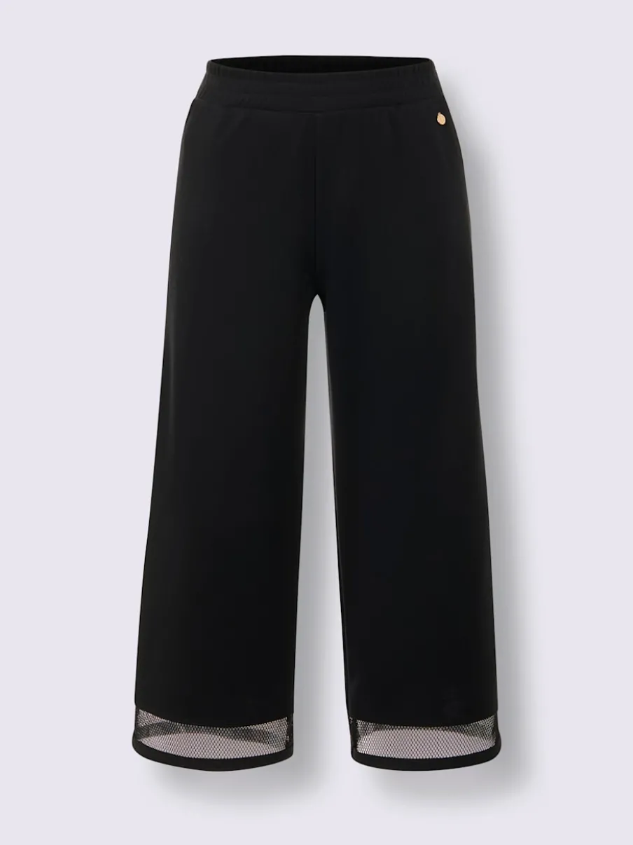Pantalon large en modal avec empiècement en résille et poches