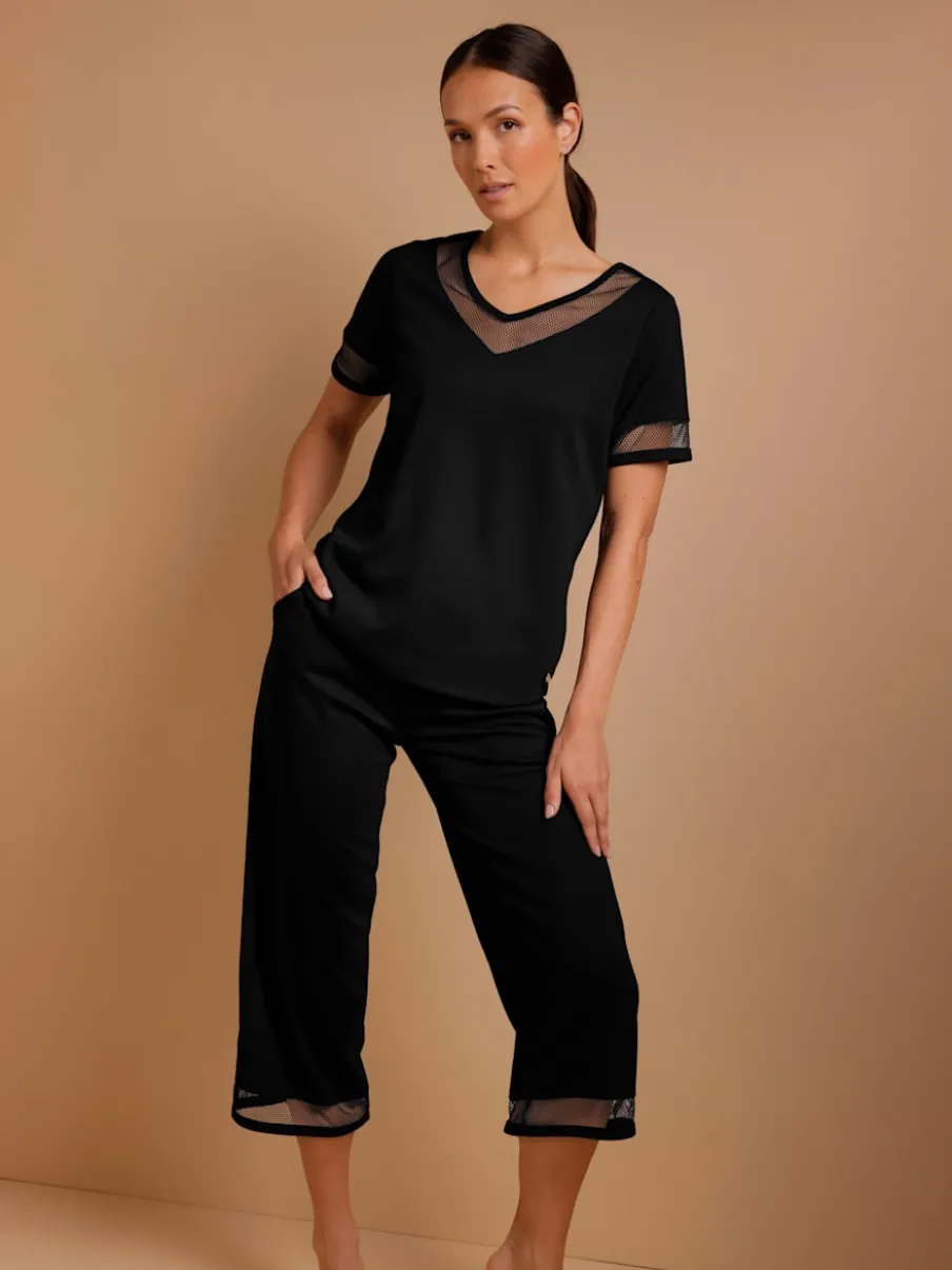 Pantalon large en modal avec empiècement en résille et poches
