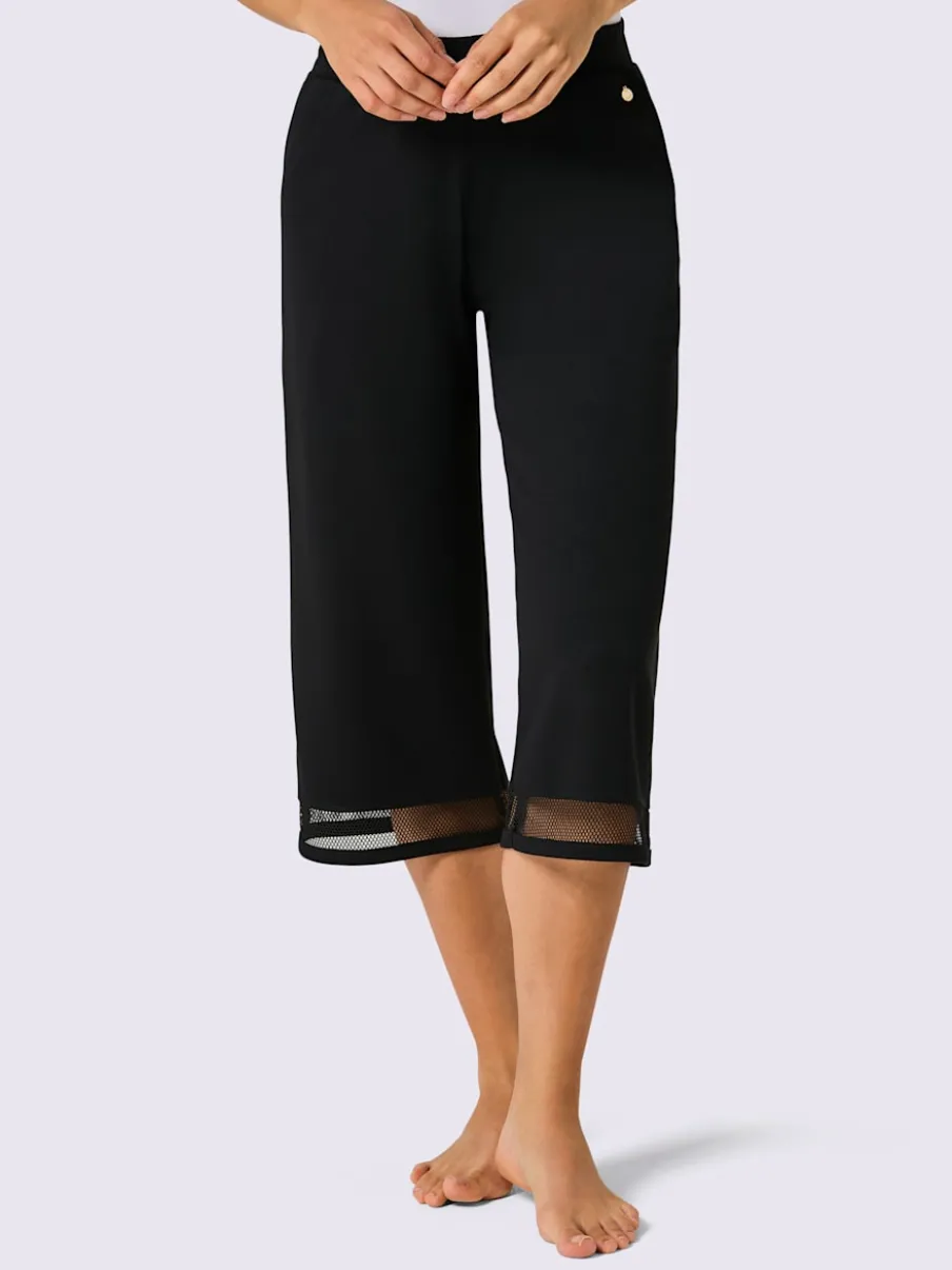 Pantalon large en modal avec empiècement en résille et poches