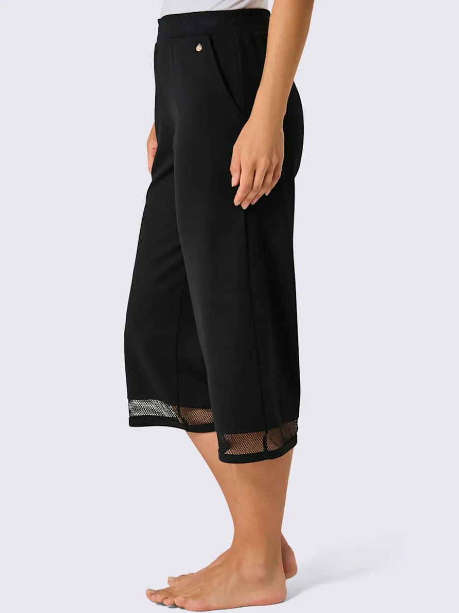 Pantalon large en modal avec empiècement en résille et poches