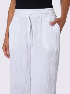 Pantalon large en mousseline avec taille haute et poches