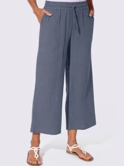 Pantalon large en mousseline avec taille haute et poches