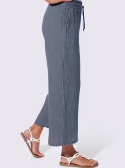 Pantalon large en mousseline avec taille haute et poches