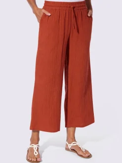 Pantalon large en mousseline avec taille haute et poches