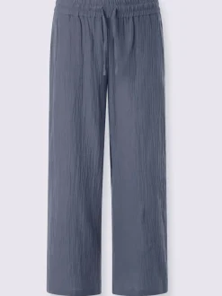 Pantalon large en mousseline avec taille haute et poches