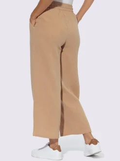 Pantalon large en mousseline avec taille haute et poches