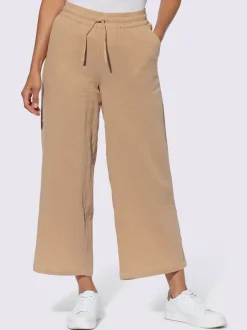 Pantalon large en mousseline avec taille haute et poches
