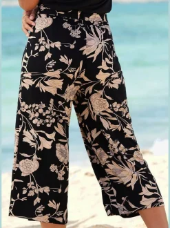 Pantalon large jupe-culotte à motif floral avec ceinture
