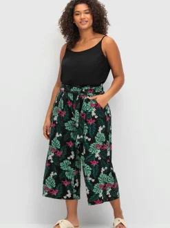Pantalon large motif feuilles tropical