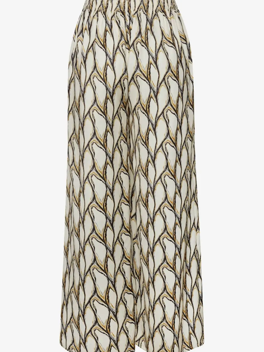Pantalon large à motifs avec ceinture smockée et poches latérales