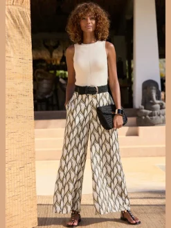 Pantalon large à motifs avec ceinture smockée et poches latérales