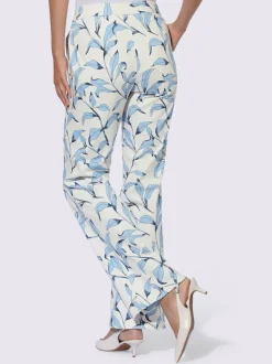 Pantalon légèrement évasé à motif floral avec poches