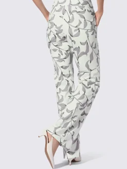 Pantalon légèrement évasé à motif floral avec poches