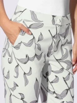 Pantalon légèrement évasé à motif floral avec poches