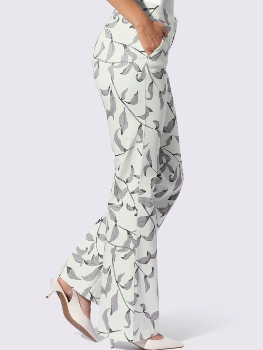 Pantalon légèrement évasé à motif floral avec poches