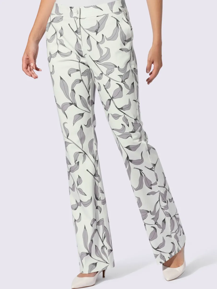 Pantalon légèrement évasé à motif floral avec poches