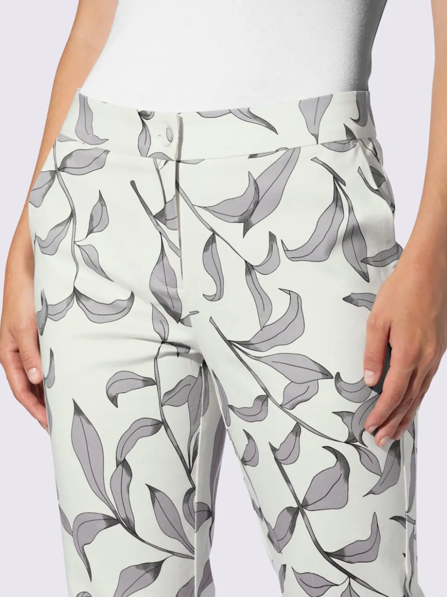 Pantalon légèrement évasé à motif floral avec poches