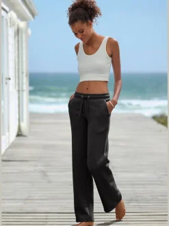 Pantalon molletonné à jambes larges avec poches latérales et coulisse