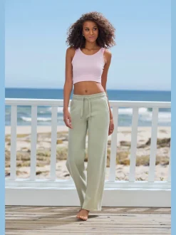 Pantalon molletonné à jambes larges avec poches latérales et coulisse