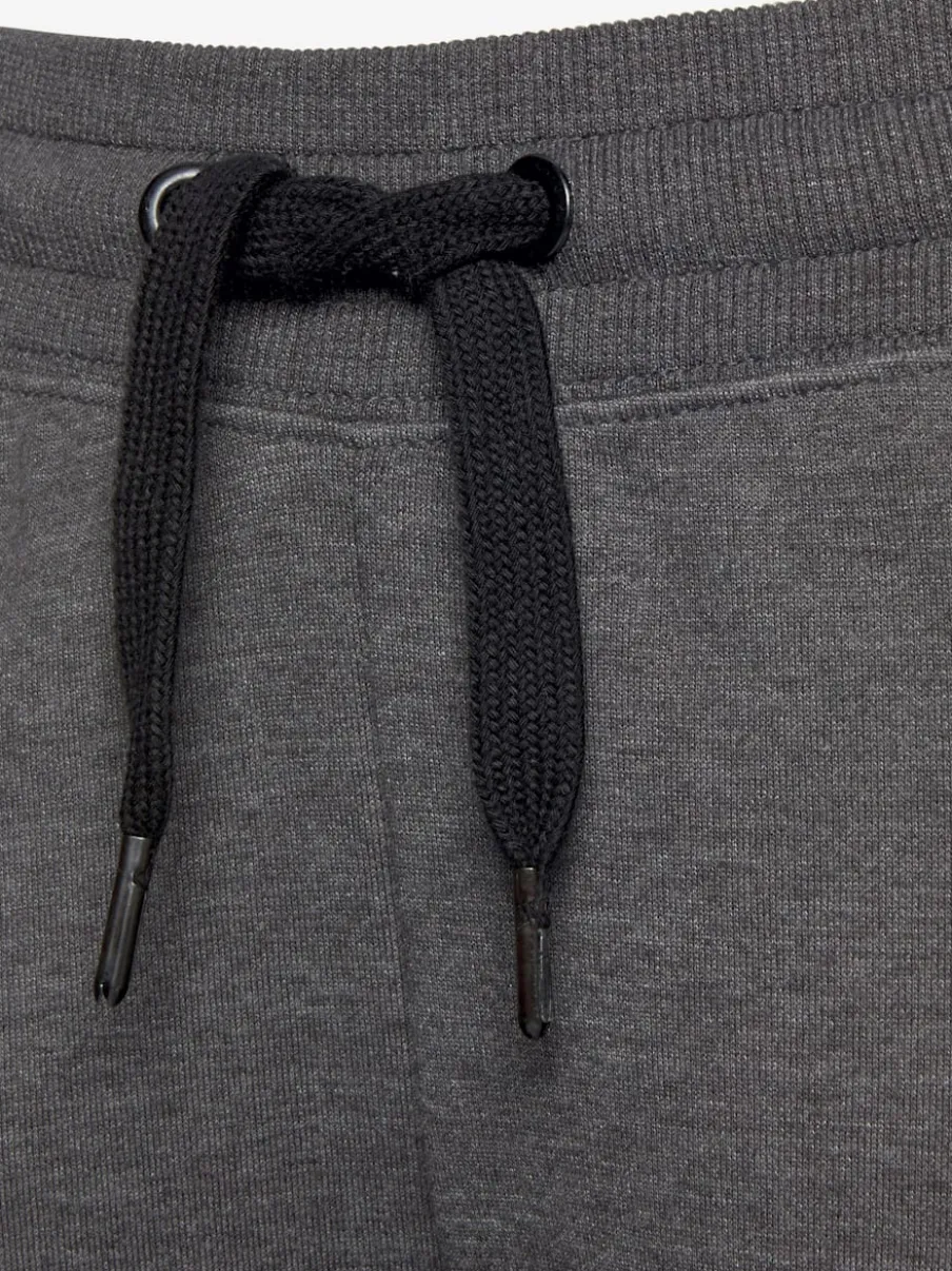Pantalon molletonné sportif à rayures latérales et poches fendues
