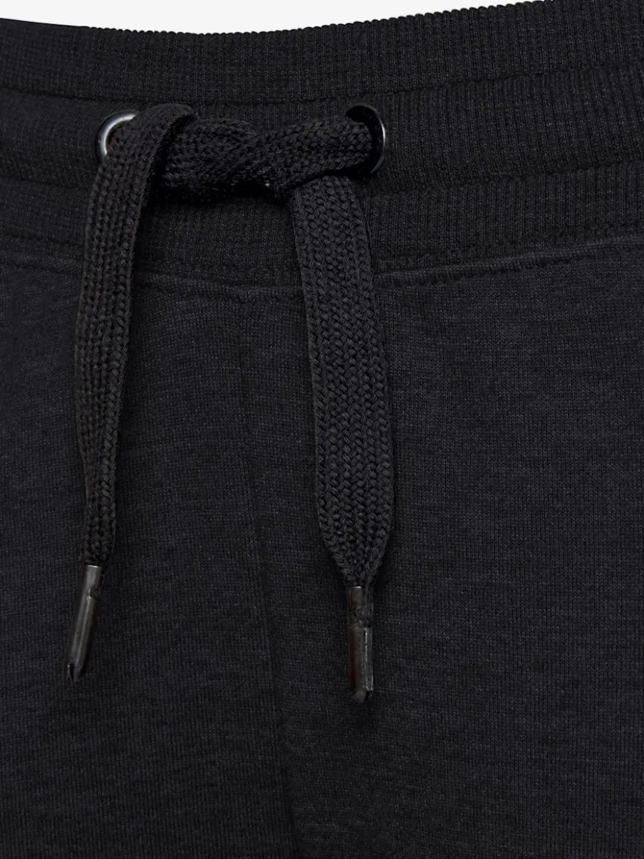 Pantalon molletonné sportif à rayures latérales et poches fendues