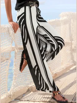 Pantalon palazzo estival avec imprimé intégral et poches latérales