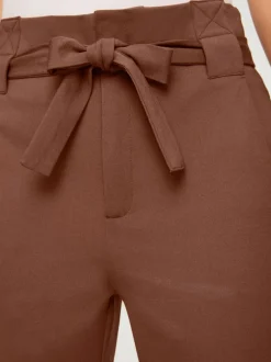 Pantalon paperbag fluide avec poches latérales confortables