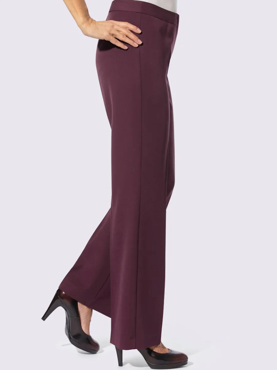 Pantalon à plis repassés avec jambes larges et ceinture gainante
