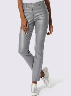 Pantalon 5 poches en matière brillante avec passants et rivets