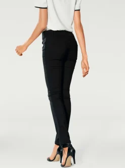 Pantalons ajustés à effet ventre plat avec poches