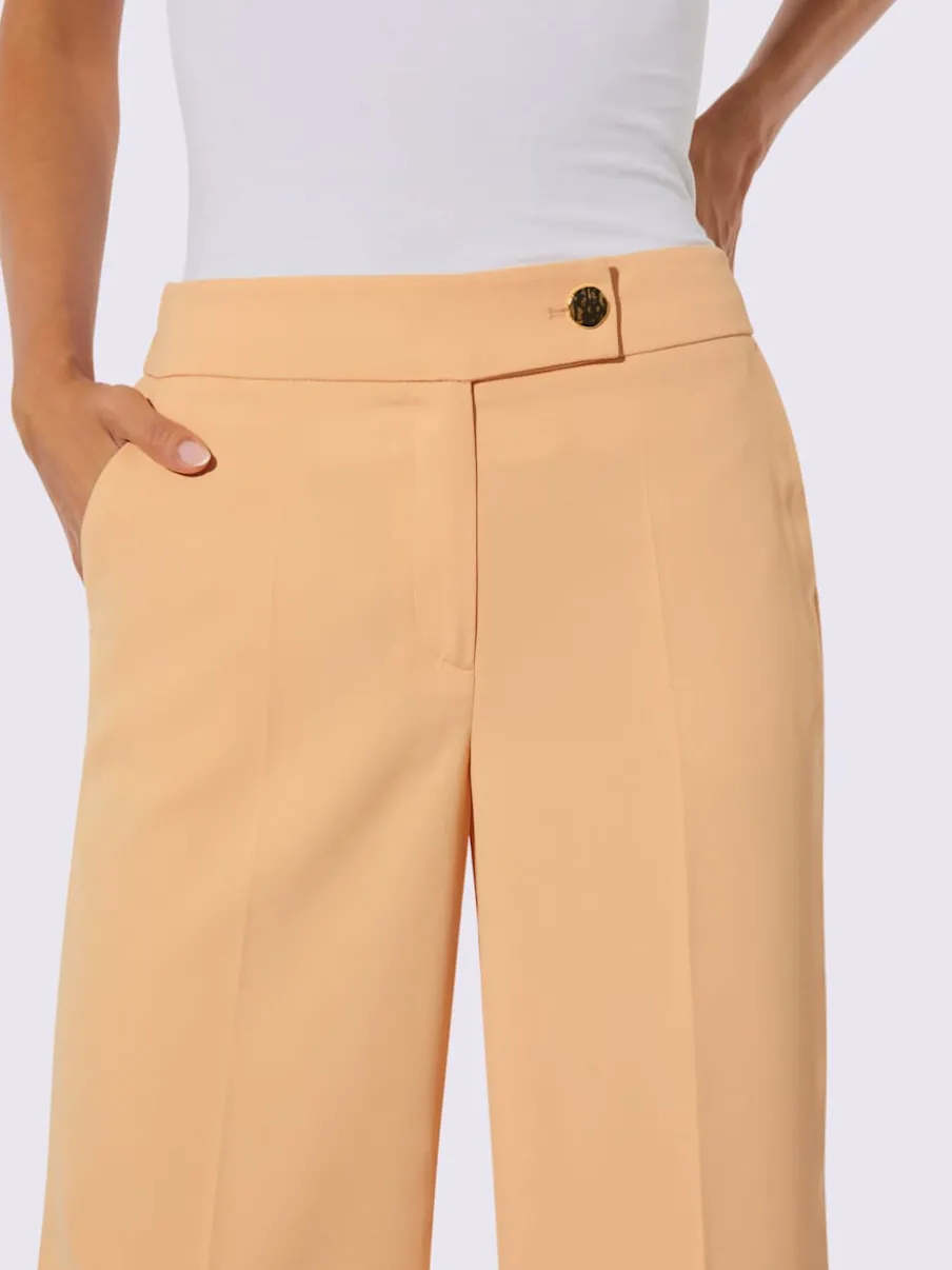 Pantalons avec ceinture gainante et poches latérales