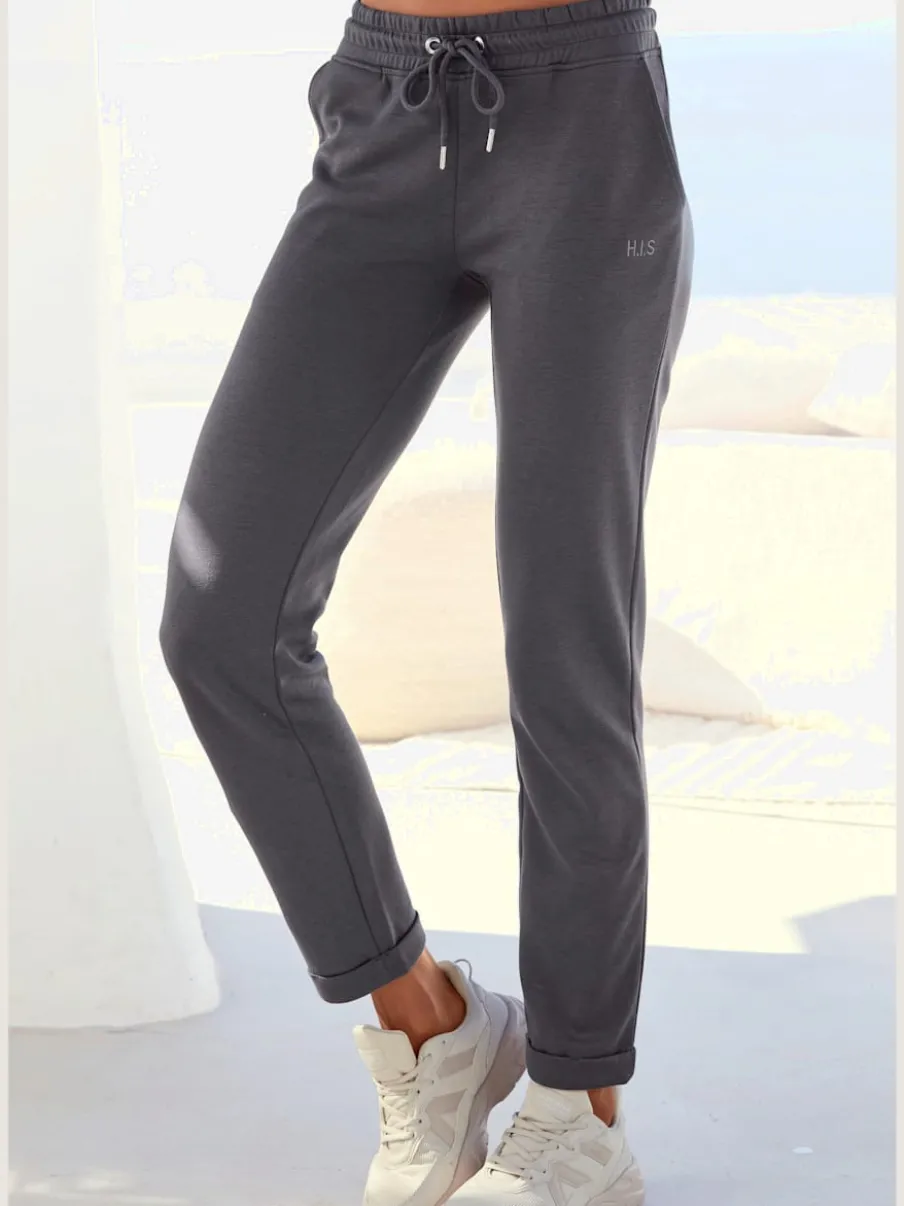 Pantalons confortables avec poches et logo brodé