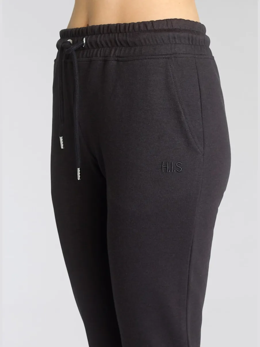 Pantalons confortables avec poches et logo brodé