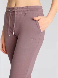 Pantalons confortables avec poches et logo brodé