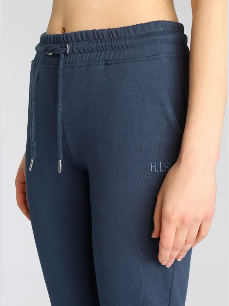 Pantalons confortables avec poches et logo brodé