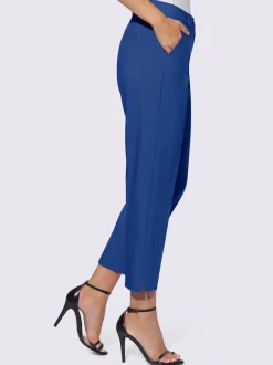 Pantalons coupe 7/8 avec poches et fente décorative