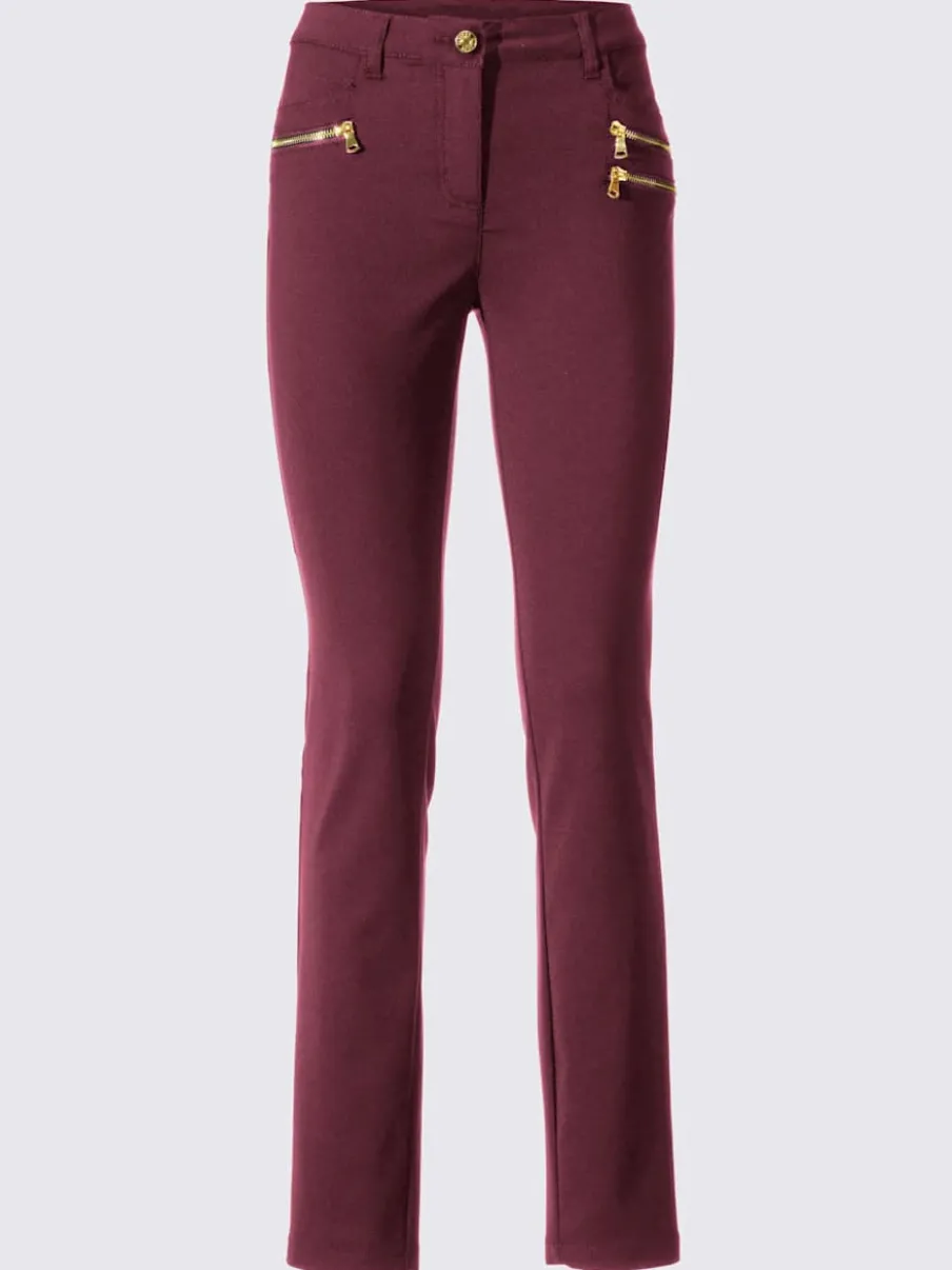 Pantalons extensibles avec coutures push-up et poches intégrées