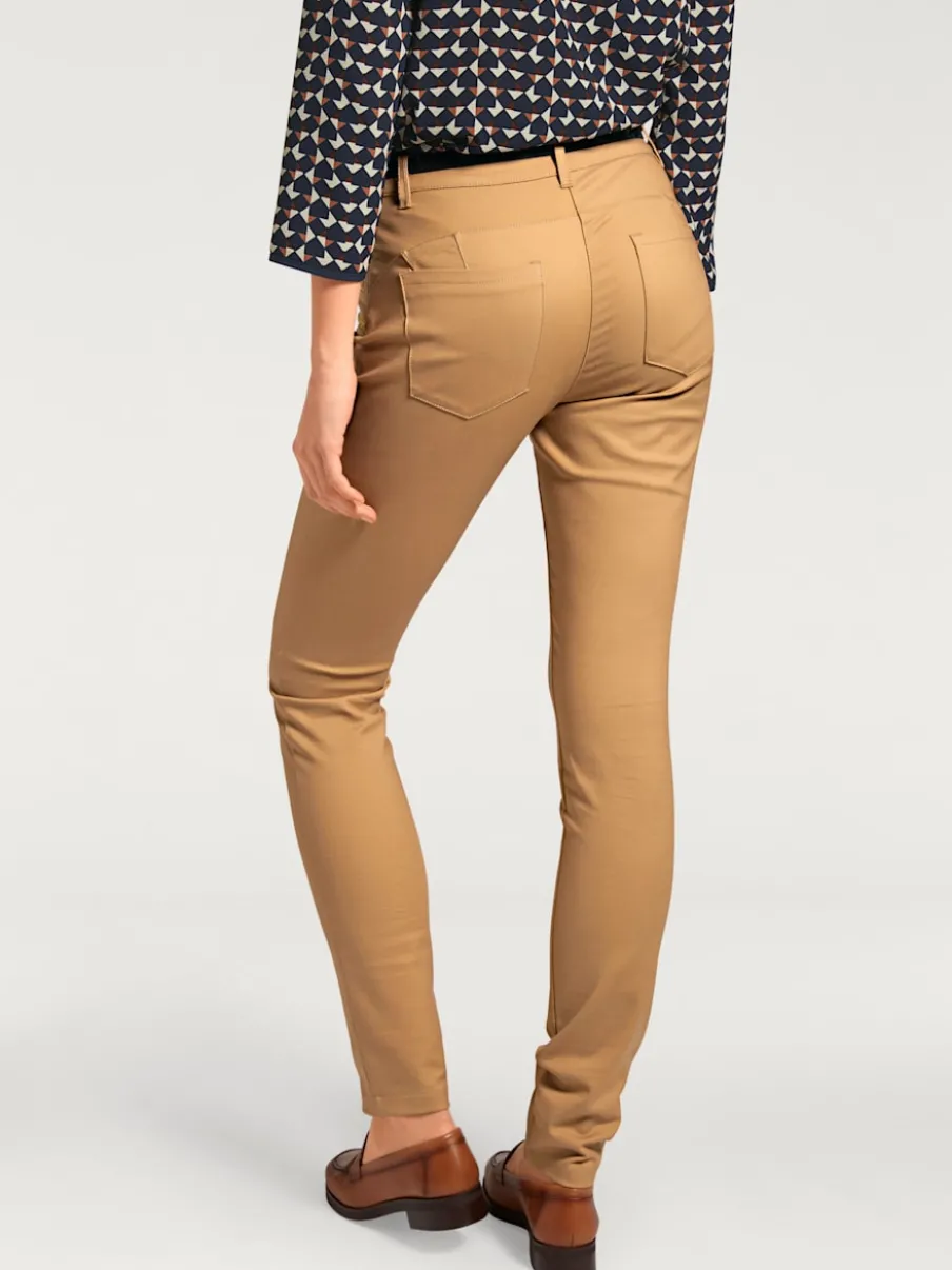 Pantalons extensibles avec coutures push-up et poches intégrées