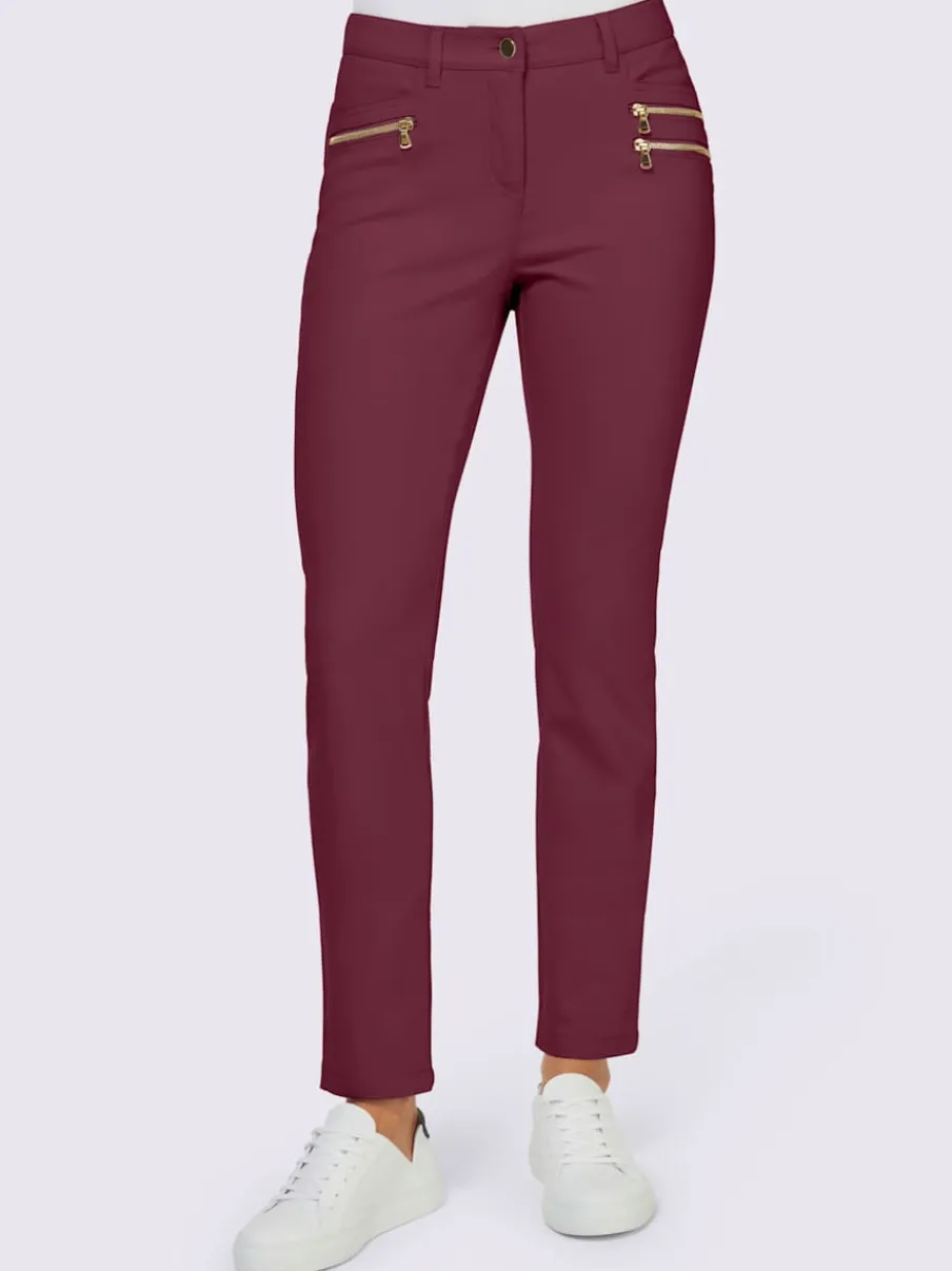 Pantalons extensibles avec coutures push-up et poches intégrées