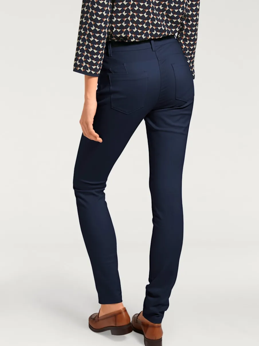 Pantalons extensibles avec coutures push-up et poches intégrées